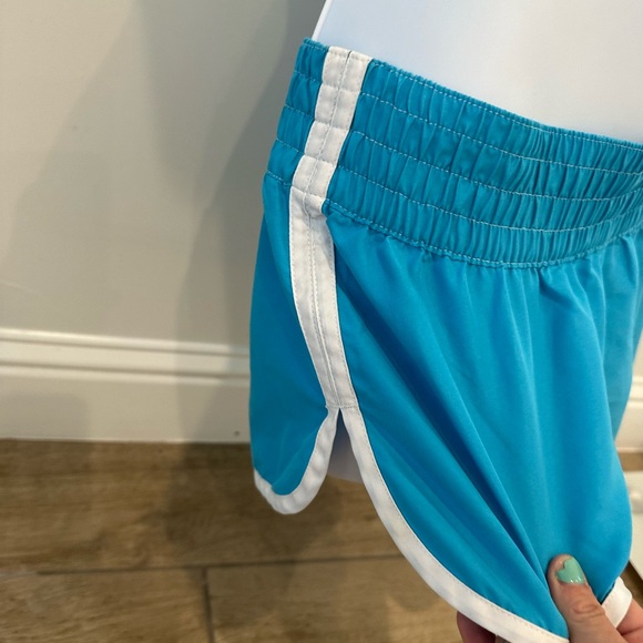 SOLDXhilaration XS Turquoise Running Shorts with White Trim - Picture 3 of 4
